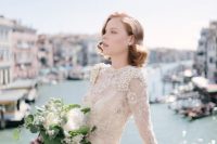a fantastic neutral wedding dress with floral applique and pearls is a jaw-dropping idea for a refined wedding in Venice