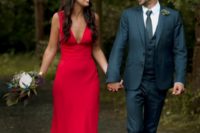 a fiery red A-line wedding dress with thick straps and a plunging neckline is a non-traditional solution
