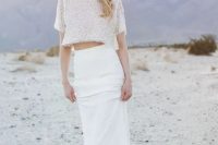 a fitting plain skirt and a sparkling short sleeve crop top are a perfect look for a modern and edgy wedding