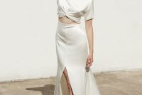a minimalist bridal separate with a silk crop top with short sleeves and an A-line maxi skirt with a front slit