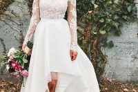 a modern bridal separate with a lace top with a turtle neckline and long sleeves, a textural high low skirt with a train and printed shoes