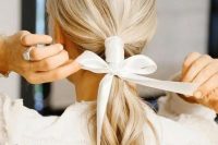 a chic ponytail for a wedding