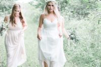 a spaghetti strap wedding gown with a lace bodice, a V-neckline and an A-line skirt for a boho bride
