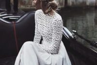 a stunning high neckline wedding dress with a boho lace bodice and long sleeves and a pleated skirt