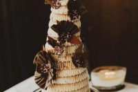 a traditional Icelandic cake called kransenkake made of almond cookies with cream inside, decorated with some chocolate for a more modern feel