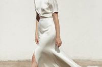 a trendy minimalist silk separate with a tied up crop top and a maxi skirt with a slit and a train is a gorgeous idea