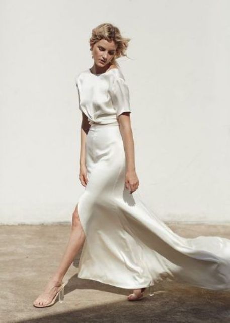 a trendy minimalist silk separate with a tied up crop top and a maxi skirt with a slit and a train is a gorgeous idea
