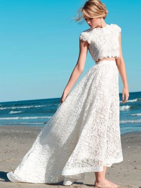 a two piece lace wedding dress with a cap sleeve crop top and an A-line high low skirt is very trendy