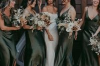 beautiful green slip silk bridesmaid dresses with asymmetrical skirts and deep V-necklines plus slits are amazing for fall weddings