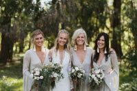 beautiful silver embellished wrap maxi bridesmaid dresses with bell sleeves and statement earrings are a chic and lovely idea for a glam wedding with a boho feel