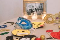 bright and fun wedding photo booth props – masks, smiles, moustaches and kisses