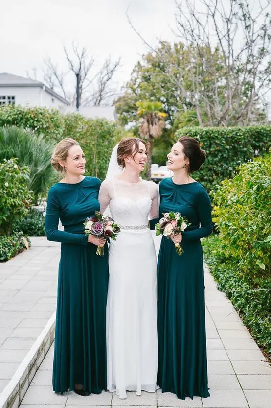 chic emerald draped bridesmaids' dresses with long sleeves for a modest look at a fall or winter wedding