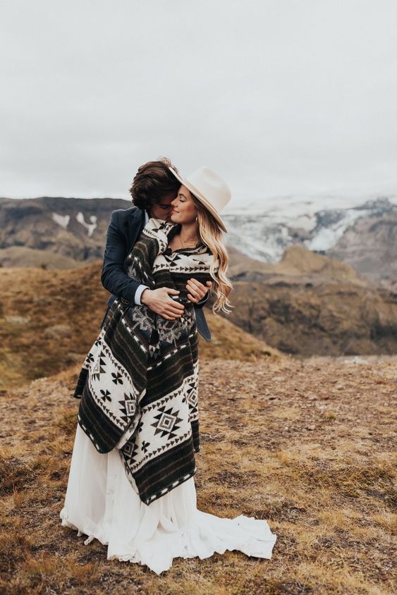 cover up with some boho blanket or shawl, add a hat to keep yourself warm while going for a walk in Iceland