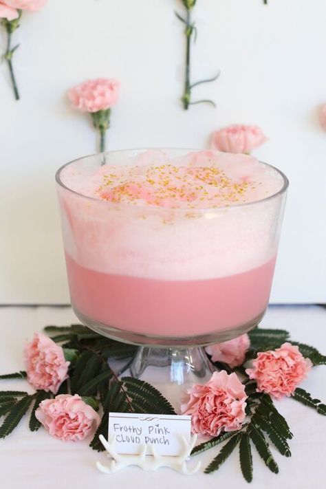 frothy pink cloud punch served with pink blooms underneath is a cute girlish party idea