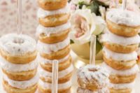 glazed donut stands are a chic and bold idea for a modern tea party bridal shower