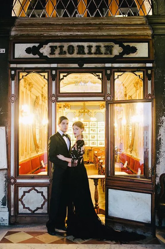 if you are planning a carnival elopement, dress up in dark attire to fit the mysterious look of the city