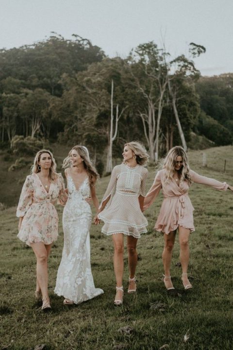 mismatching blush and white short bridesmaid dresses with various prints are amazing for a summer or spring wedding