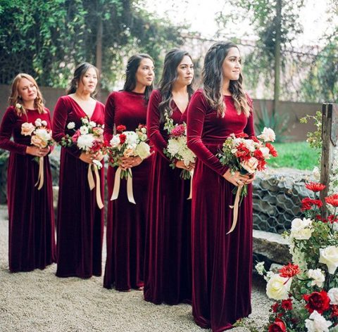 mismatching burgundy velvet maxi bridesmaid dresses with various necklines are perfect for a fall or winter wedding