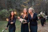 mismatching navy bridesmaid maxi dresses with deep necklines and long sleeves are amazing for an elegant fall wedding