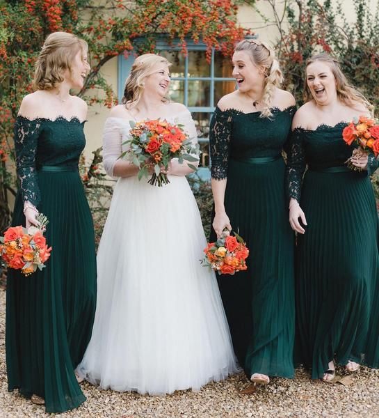 off the shoulder dark green maxi bridesmaid dresses with lace bodice and sleeves and pleated skirts for a fall wedding