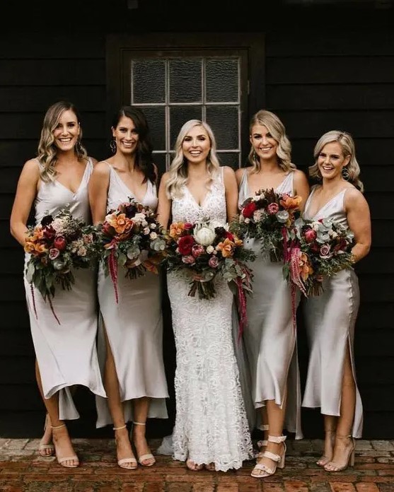 white silk midi high low bridesmaid dresses with V-necklines and side slits look chic are ideal for a modern or minimalist wedding