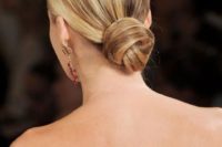a super sleek low bun is classics that will work for most of styles but especially for minimalist