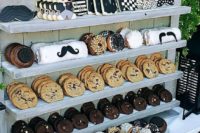 a wedding cookie bar style as a men’s one, with fun sweets that are styled for guys