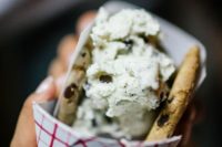 an ice cream sandwich with chocolate chip cookies for a late-night wedding snack