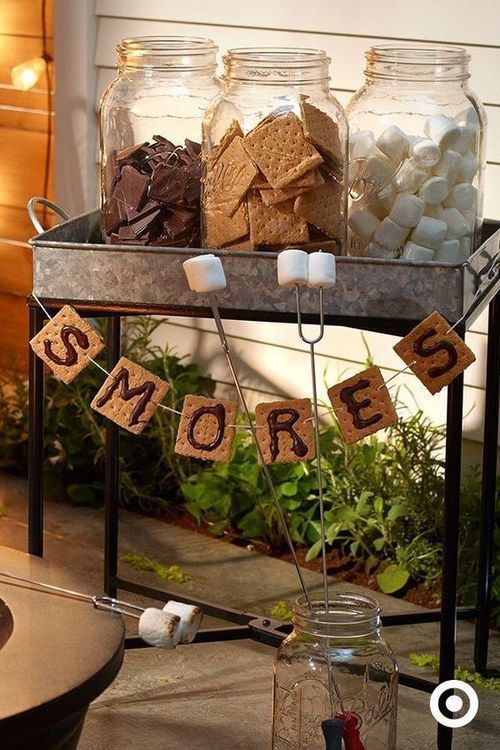 an s'mores station is a perfect idea for a bbq rehearsal dinner, it will break the ice and make people feel cozy