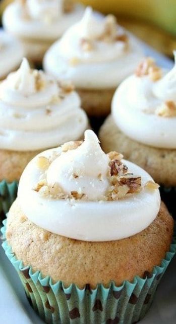 banana cupcakes with cream cheese buttercream frosting and nuts on top are delicious for your wedding