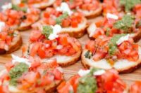 bruschettas with fresh herbs and tomatoes are perfect for vegan weddings, too