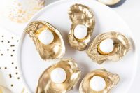champagne truffles on gilded half shells are amazing for a 1920s wedding or wedding-related party