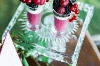 fresh berry parfait topped with berries – blackberries and currant of various types for a summer wedding