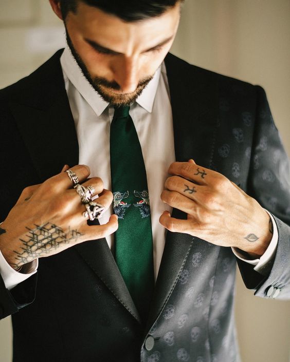if you have hand tattoos, nothing will preent you from showing them off in any wedding attire
