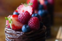 mini double chocolate cakes with raspberries, strawberries and blueberries are delicious for any refined wedding