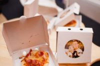 mini pizzas in boxes with the couple’s photos are a great and personalized late night snack idea