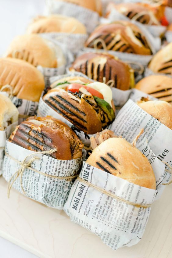 pack cool burgers into simple paper and secure them with twine to make them comfortable to serve