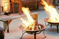 place several fire pits for gathering, getting to know each other and making s’mores at your rehearsal dinner