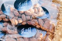 sugared nuts packed in clear packs, with lovely stickers are amazing wedding favors to go for