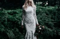 07 a modest yet sexy lace mermaid wedding dress with long sleeves and a high neckline is a gorgeous way to show off your curves