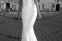 13 a gorgeous plain mermaid wedding dress with a deep sweetheart neckline and lace strpas, with lace inserts and a train is a sexy idea to show off your figure