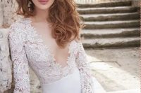 16 a gorgeous fitting wedding dress with a lace bodice with long sleeves and a seductive plunging neckline plus a plain skirt is a gorgeous idea to look jaw-dropping at your wedding