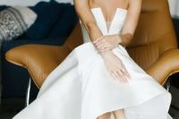 37 a stunning A-line strapless plain wedding dress with a covered plunging neckline to impress but still to make it comfortable to wear the dress