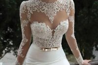 42 a sheath wedding dress with a lace bodice, an illusion sweetheart neckline, long sleeves and a plain skirt