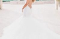54 a gorgeous mermaid wedding dress with no sleeves, an open back and a full skirt with a train to make a statement – flaunt your gorgeous back
