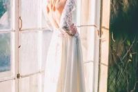59 an A-line wedding dress with a lace bodice and a plain skirt plus an open back that inspires and wows – that’s super sexy