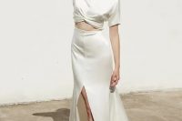71 a minimalist plain bridal separate with a silk crop top with short sleeves and an A-line maxi skirt with a front slit