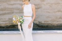 75 a minimalist, chic and sexy plain bridal separate with a halter neckline crop top and a mermaid skirt with a train is gorgeous
