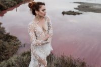 86 a celestial white sheer wedding dress with long sleeves and a train can be worn with some underwear or a bodysuit under