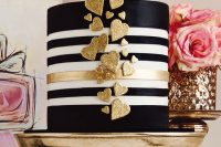 a glam wedding cake with golden touches